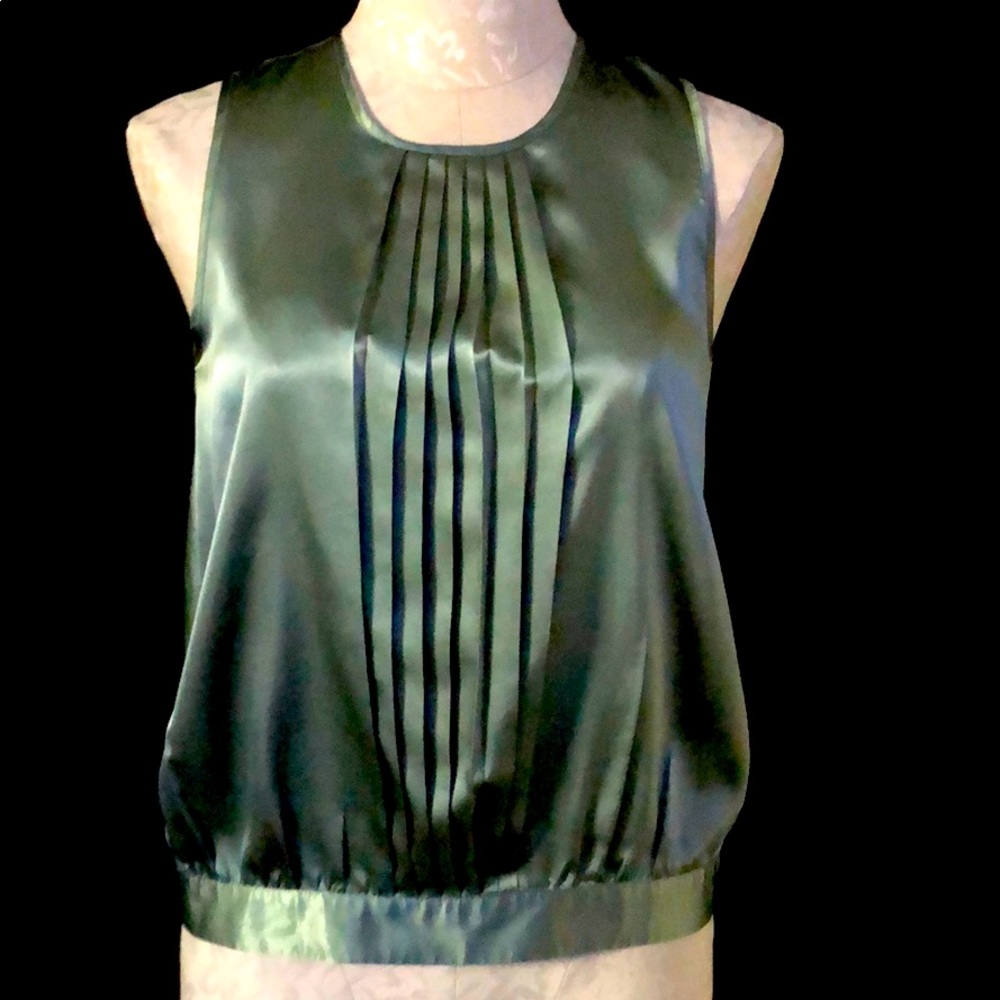BCBG MaxAzria green silky sleeveless blouse.